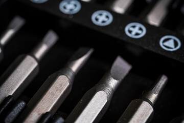 a set of screwdrivers on a wooden background