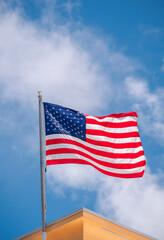 Obraz premium american flag on sky miami