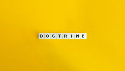 Doctrine Word on Block Letter Tiles on Yellow Background. Minimal Aesthetic.