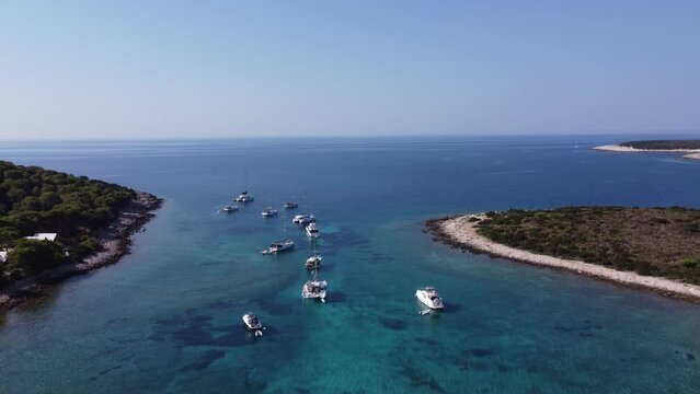 Various Boats and Catamaran Yachts anchored at Blue Lagoon Bay of Veliki Budikovac Island in Croatia.
Aerial