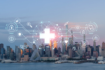 New York City skyline from New Jersey over Hudson River, Midtown Manhattan skyscrapers at sunset, USA. Health care digital medicine hologram. The concept of treatment and disease prevention