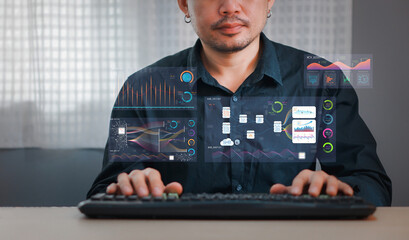 Big Data Technology for Business Finance Analytic Concept. Modern graphic interface shows massive information of business sale report, profit chart and stock market trends analysis on screen monitor.
