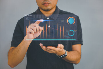 Big Data Technology for Business Finance Analytic Concept. Modern graphic interface shows massive information of business sale report, profit chart and stock market trends analysis on screen monitor.
