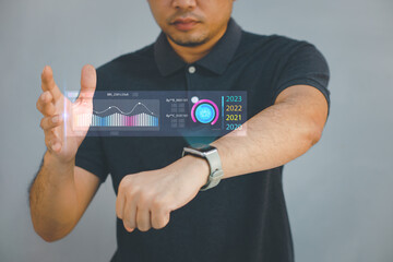 Big Data Technology for Business Finance Analytic Concept. Modern graphic interface shows massive information of business sale report, profit chart and stock market trends analysis on screen monitor.
