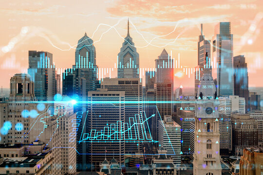 Aerial panoramic skyline of Philadelphia financial downtown, Pennsylvania, USA. City Hall Clock Tower at sunset. Forex candlesticks and bar graph hologram. The concept of internet trading, brokerage