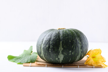 Green Japanese pumpkin on white background, Organic vegetable