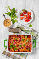 strawberry cobbler, summer dessert in baking dish