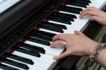 Fototapeta na wymiar Serenading the Keys: Young Pianist's Soulful and Expressive Performance