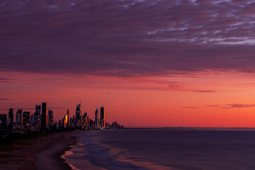 Colourful sunrise skies over Surfers Paradise skyline, view from Miami Hill. Gold Coast, Australia