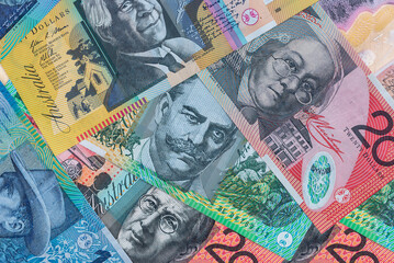 Pile of australian dollars on wooden desk