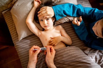 Family taking care of sick child at home