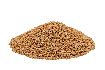 Buckwheat isolated on white background. Pile of buckwheat grains