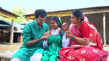 Shiksha, Beti bachao Beti padao. Importance of education - Indian village girl. Her parents are thrilled with their daughter's outstanding performance, as she proudly won a well-deserved medal.