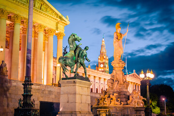 Night summer view of Pallas-Athene-Brunnen, Austrian Parliament Building and NEOS Wien Rathausklub...