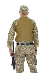 Back view of soldier standing against white background. Portrait of old defender with gun isolated...