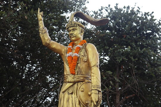 Kathmandu, Bagmati Nepal- June 9 2023: Big Golden idol of Nepali King- Prithvi Narayan Shah who is pointing his finger to the sky.