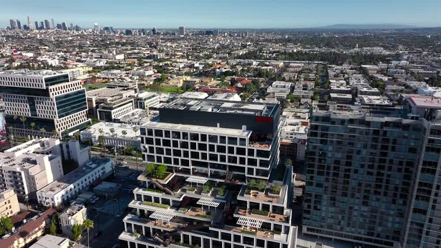 Aerial View of Netflix Corporate Office Buildings in Hollywood With Downtown LA in Background