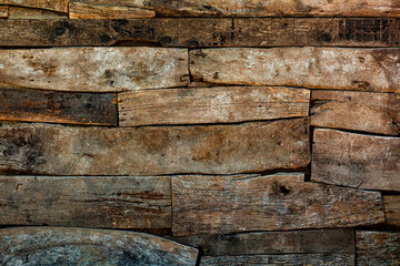 Wood texture background, wooden surface. Reclaimed planks of wood damaged by the aging process.