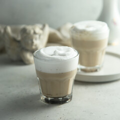 Homemade coffee latte macchiato served for two