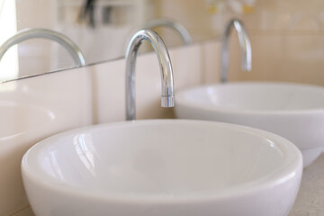 Bathroom sink with faucet, closeup