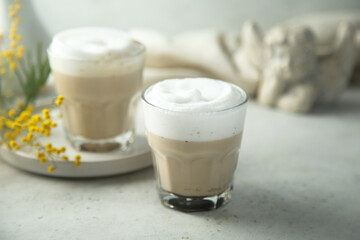 Homemade coffee latte macchiato served for two