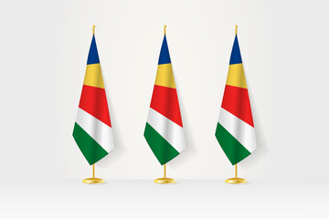 Three Seychelles flags in a row on a golden stand, illustration of press conference and other meetings.