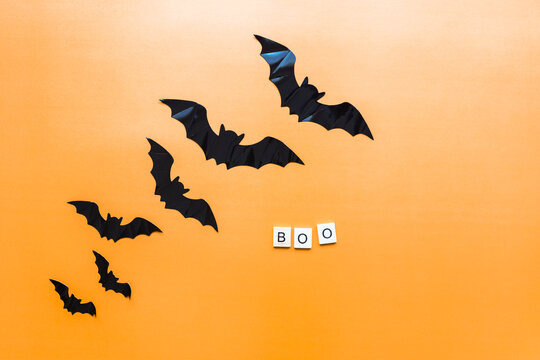 Flat lay halloween. Boo inscription. The bats