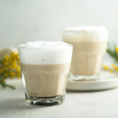 Homemade coffee latte macchiato served for two