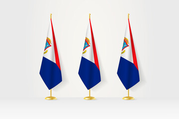 Three Sint Maarten flags in a row on a golden stand, illustration of press conference and other meetings.