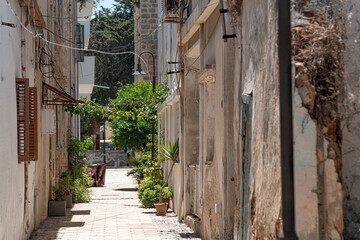 Fototapeta na wymiar Cozy pedestrian street in the old town of Famagusta. Cyprus