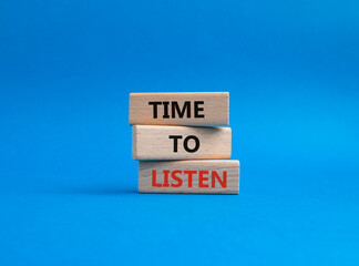 Time to listen symbol. Wooden blocks with words Time to listen. Beautiful blue background. Business and Active listening concept. Copy space.