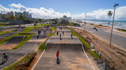 Drone view of cyclists in bmx race during practice lap