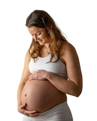 Happy mother hold her naked, round, pregnant belly with her hands and waits for her baby. Third trimester - week 36. Front view. White background. Bright shot.