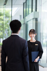 Verticals of women in the hospitality industry who work as receptionists or guides at hotels on business trips or during visits Image of tourism in Japan