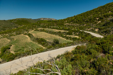 Narrow road in the mountains, Torremanzanas village, Alicante province, Costa Blanca, Spain