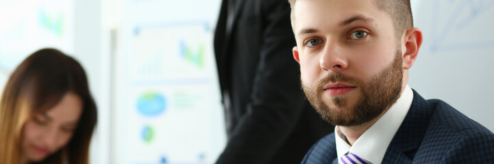 Fototapeta premium Portrait of leader with business team behind. business advice and assistant consultant concept