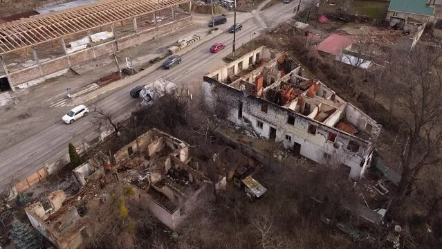 Drone shot over a destroyed residential building after Russian shelling in Ukraine, Bucha - Kyiv Oblast.