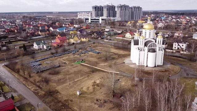 Drone shot moving around the Church of Saint Andrew and Pyervozvannoho All Saints. Ukraine, Bucha - Kyiv Oblast.