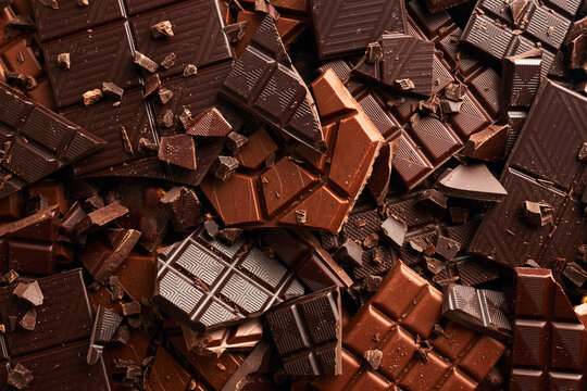 Broken chocolate bar texture background