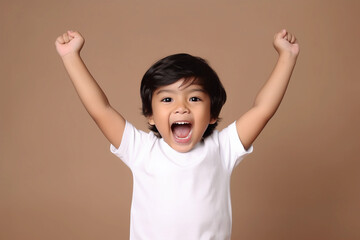 An energetic kid wearing a white tshirt