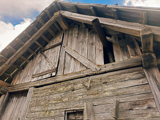 Cabin in the mountains on a meadow