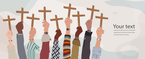 Group of multicultural christian people hands raised holding a wooden crucifix. Christian worship.Praying or singing. Concept of faith and hope in Jesus Christ. Copy space banners