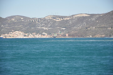 Panoramic view of Bakar city with rough Adriatic sea in Croatia.Rough Adriatic Sea and Bura wind in Bakar gulf.