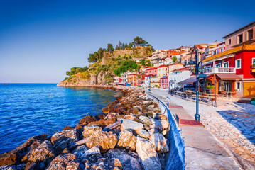 Fototapeta premium Parga, Greece. Picturesque coastal town in Epirus region, sunrise golden hour.