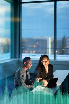 Finance specialists working at night