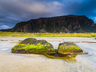 Storm clouds over sandy beach