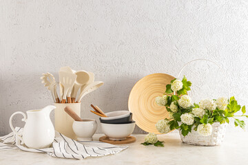 Modern kitchen countertop background in an eco-friendly kitchen with a variety of wood and ceramic items. Eco style. Zero waste.