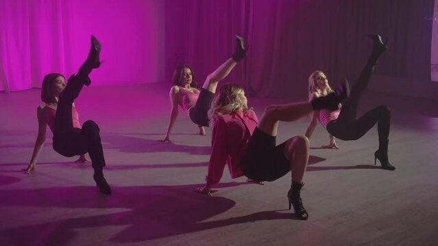 Dancing in high heels with a trainer helps to form the flexibility and plasticity of the body. High quality 4k footage