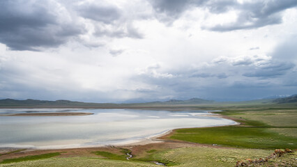 beautiful mountain lake. clouds over a mountain lake. mirror lake