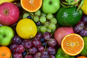 Naklejka na ściany i meble Fresh fruits, assorted fruits, colorful background. Healthy fruits and vegetables concept.